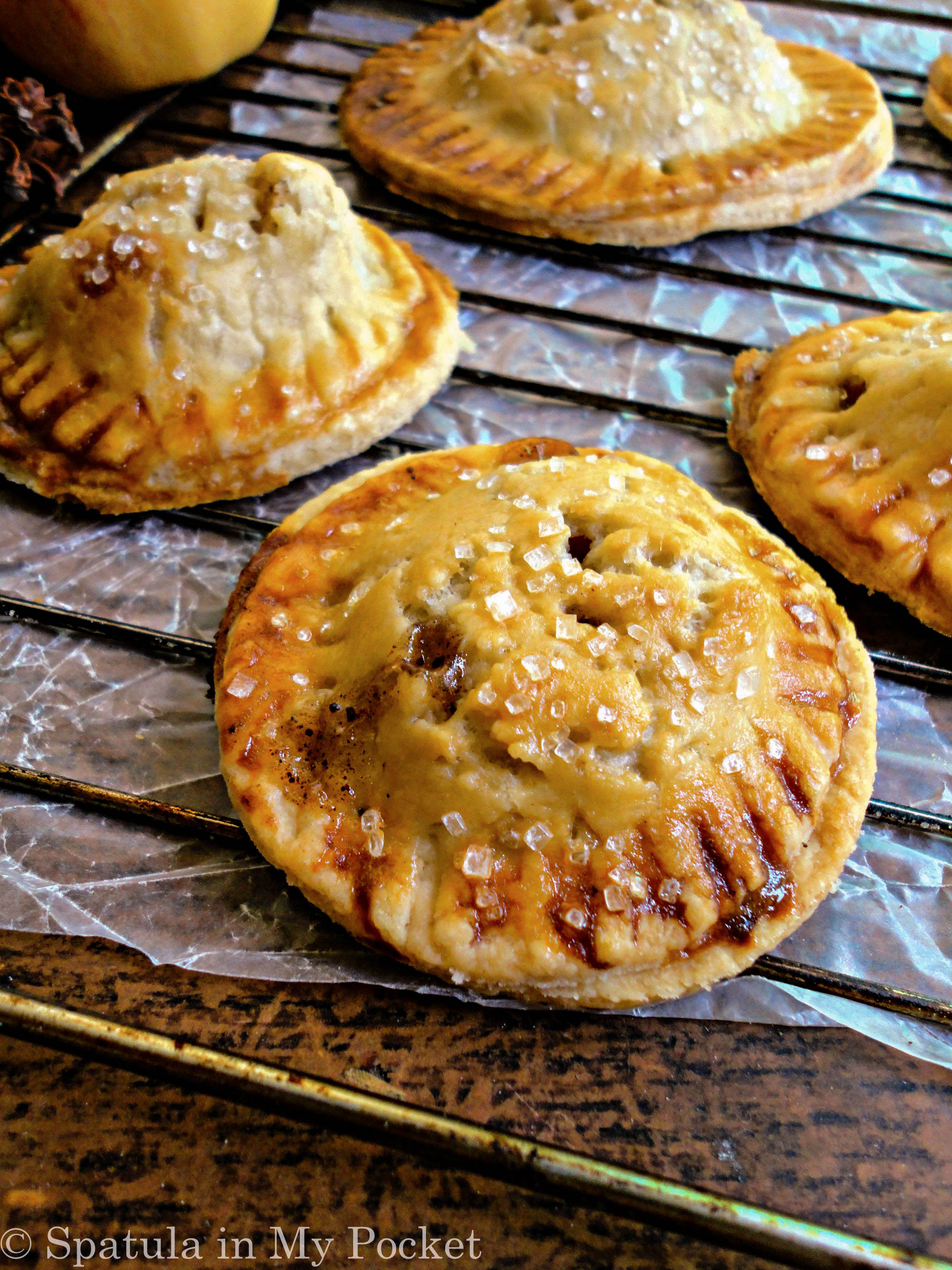 Mini apple pies. The flaky buttery crust filled with a cinnamon scented apple filling should definitely be on your to-bake list this winter!