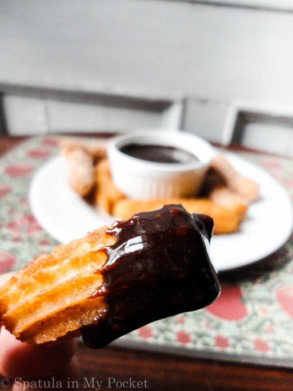Crispy, golden churros rolled in cinnamon and sugar and dunked in a dark chocolate sauce #churros